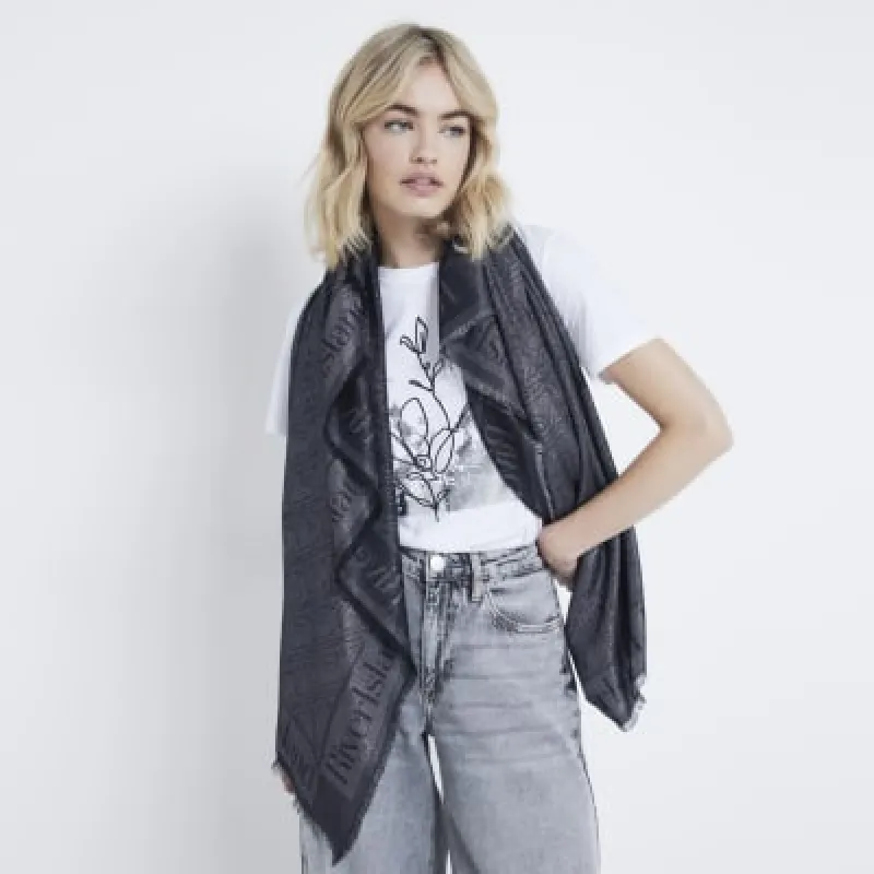 Black metallic monogram lightweight scarf sold by River Island
