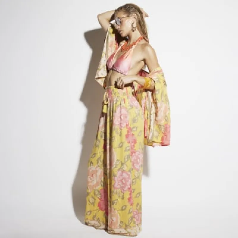 Pink floral wide leg beach trousers sold by River Island