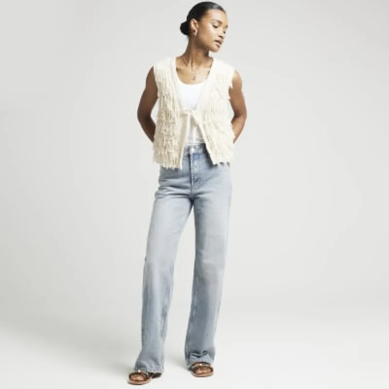 Cream knitted fringe gilet sold by River Island