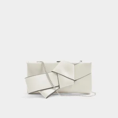 Cream knot detail clutch bag sold by River Island