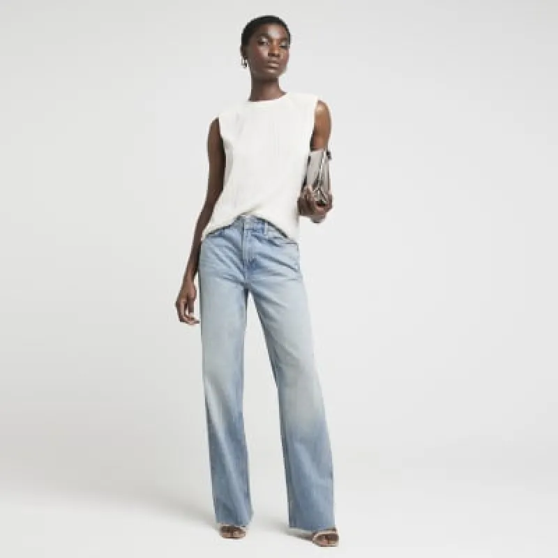 Cream cowl back plisse top sold by River Island
