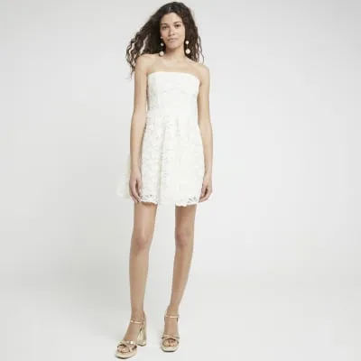 Cream Lace Bandeau Skater Mini Dress sold by River Island