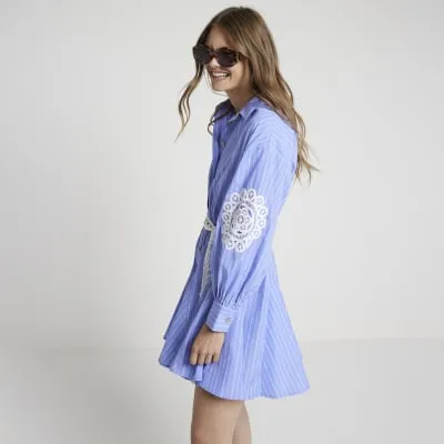 Blue stripe broderie mini shirt dress sold by River Island