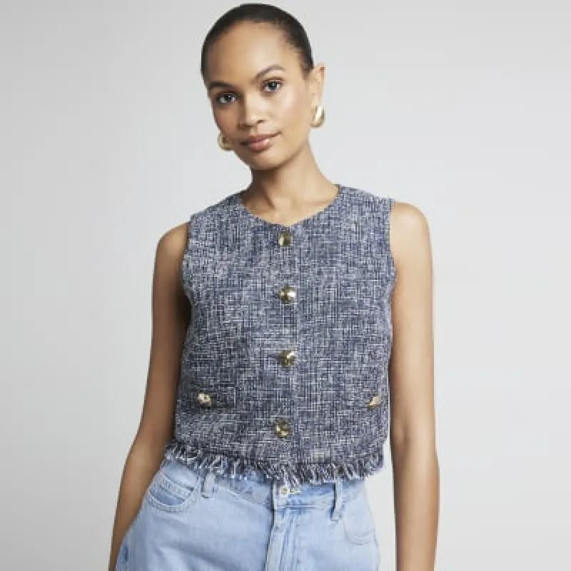 Navy boucle fringe hem waistcoat sold by River Island