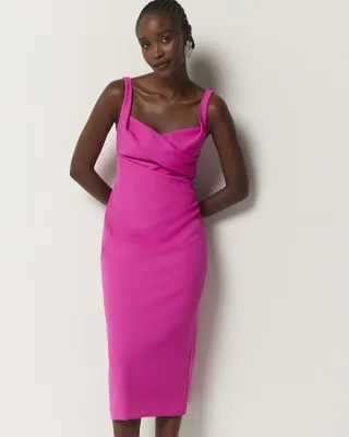 Pink ruched open back bodycon midi dress sold by River Island