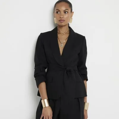 Black belted linen blend wrap blazer sold by River Island