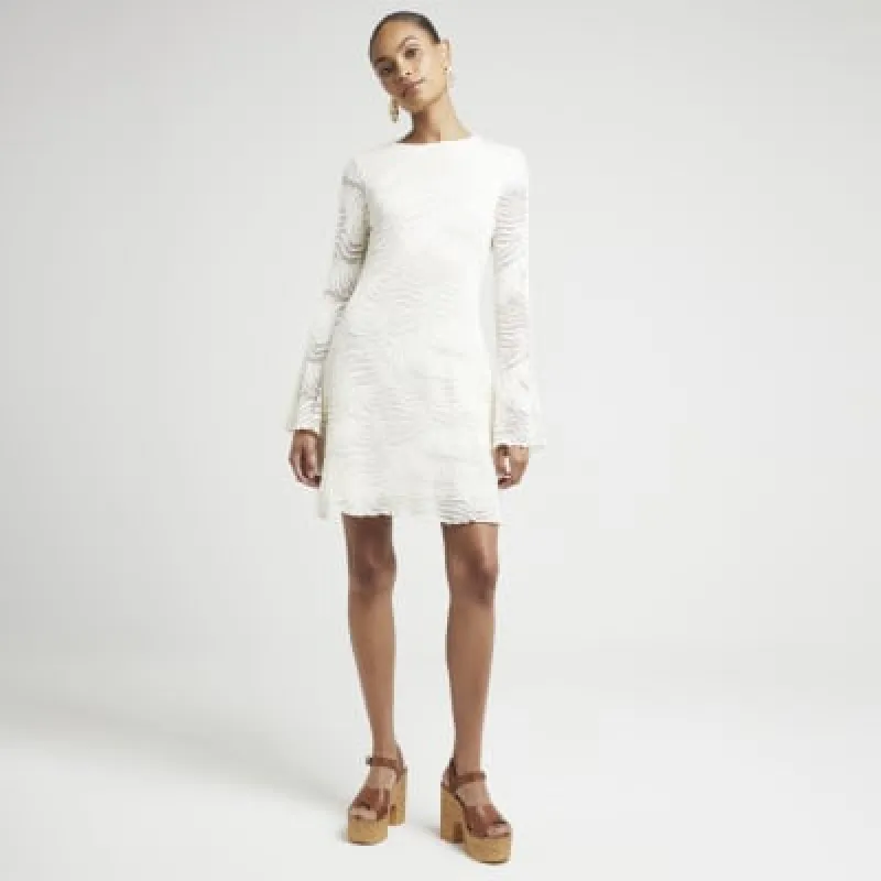 Cream crochet skater mini dress sold by River Island