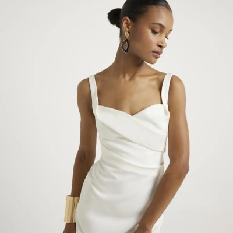 White ruched open back bodycon midi dress sold by River Island
