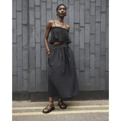 Black beaded poplin maxi skirt sold by River Island