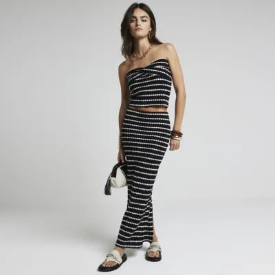 Black monochrome crochet maxi skirt sold by River Island