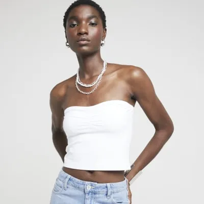 White ruched front bandeau top sold by River Island