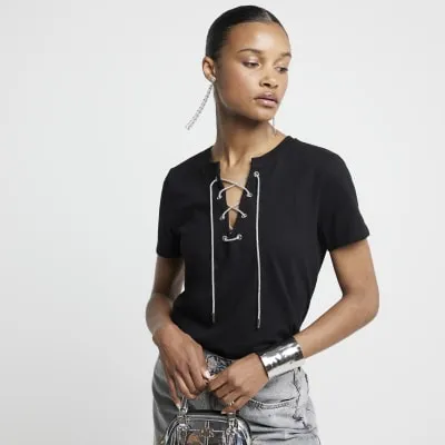 Black embellished lace up top sold by River Island