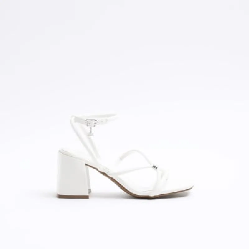 White strappy heeled sandals sold by River Island