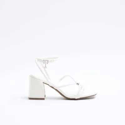 White strappy heeled sandals sold by River Island