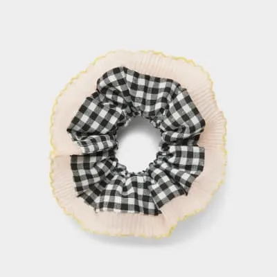 Pink gingham print hair scrunchie sold by River Island