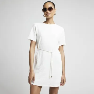 Cream textured belted t-shirt mini dress sold by River Island