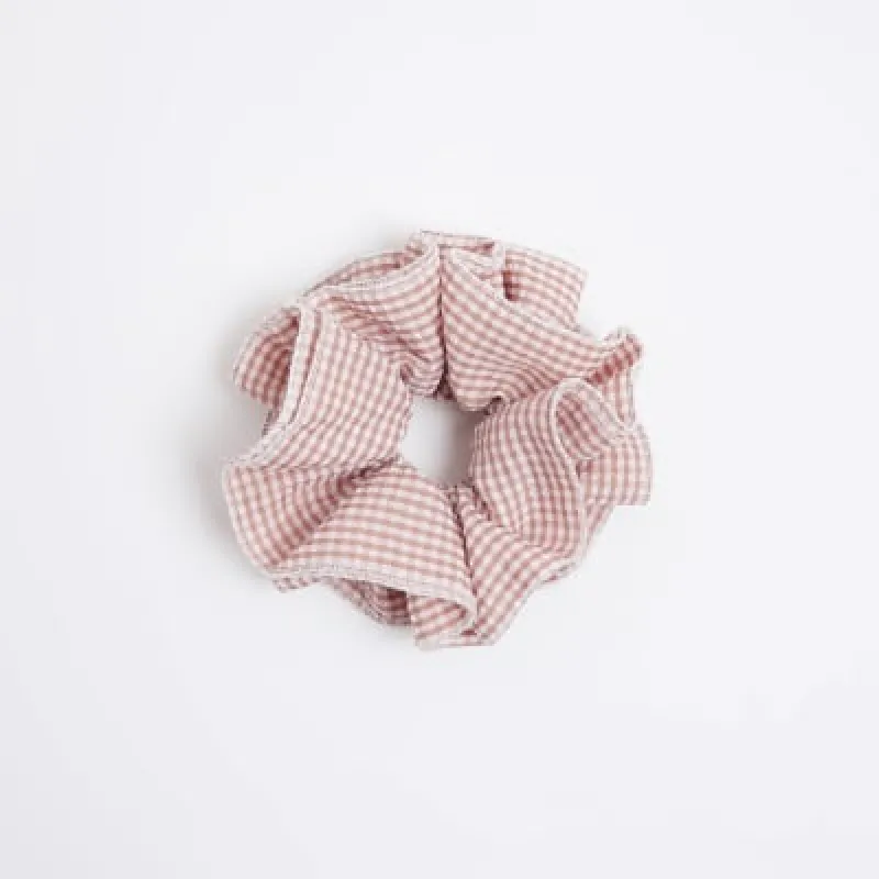 Pink stripe hair scrunchie sold by River Island