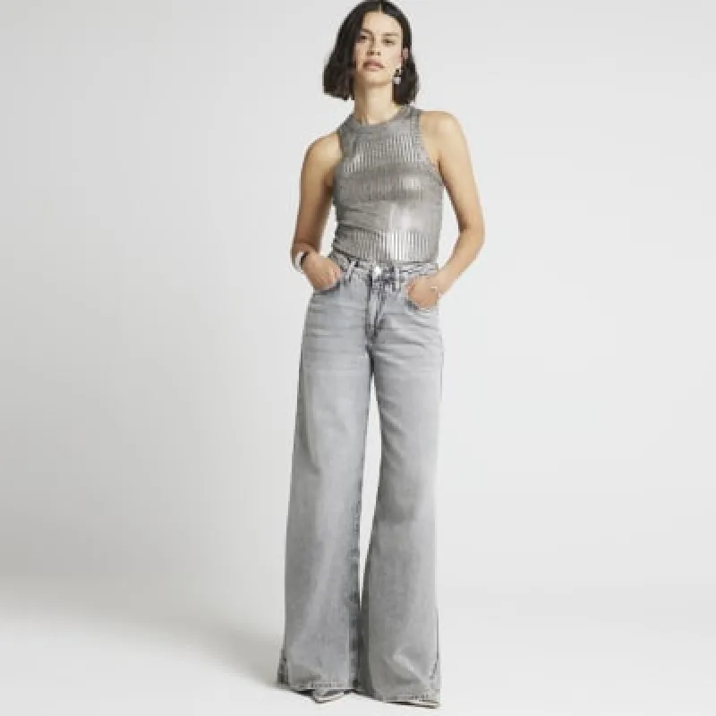 Silver ribbed foil racer vest top sold by River Island