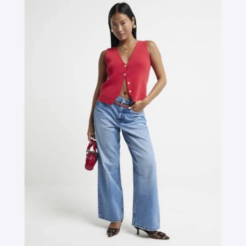Petite blue relaxed straight fit jeans sold by River Island