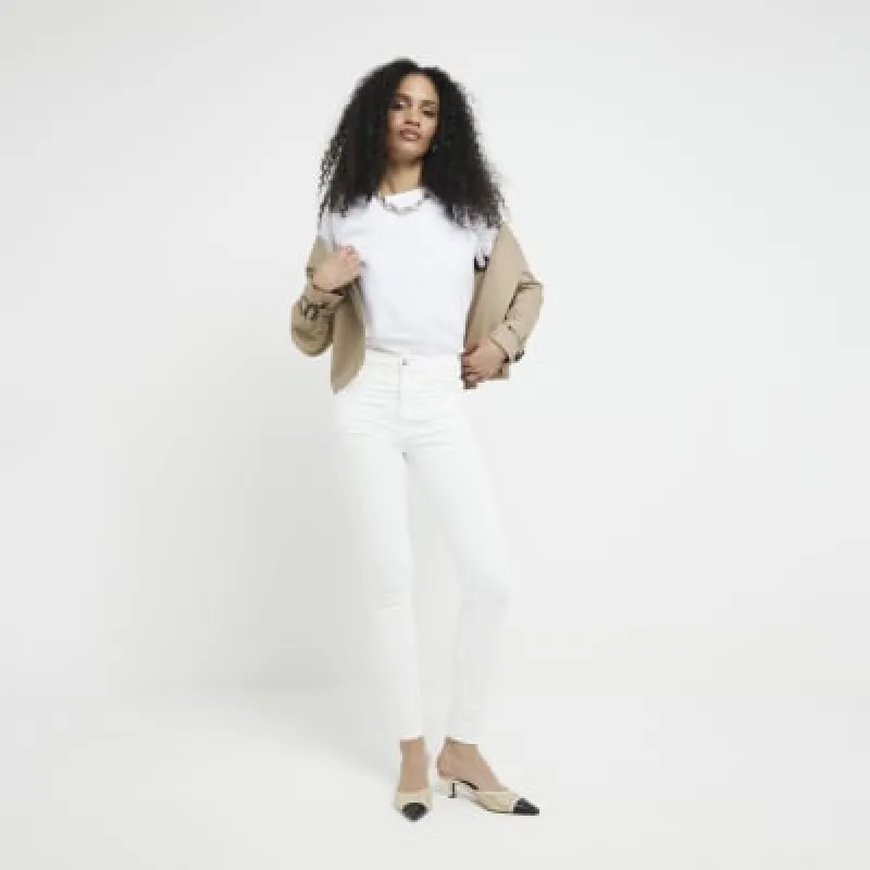 White high waisted bum sculpt skinny jeans sold by River Island