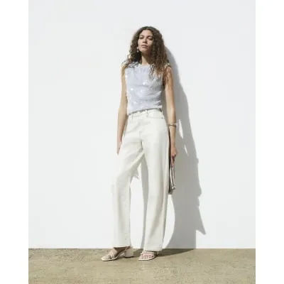 Cream glitter relaxed straight jeans sold by River Island