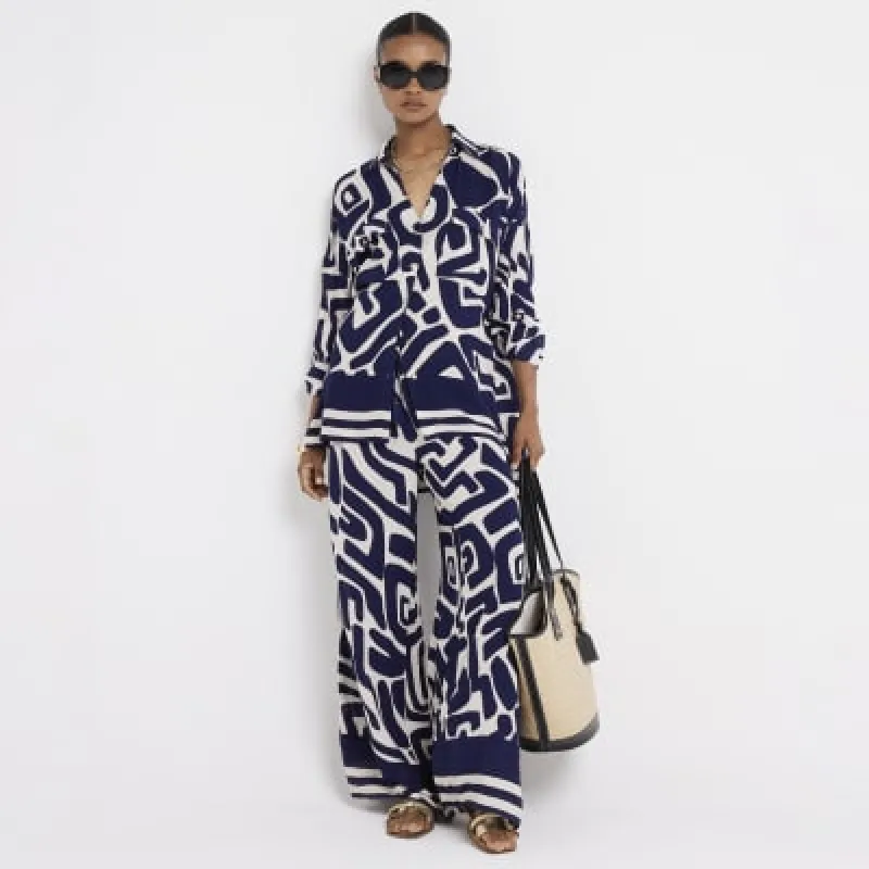 Navy abstract beach shirt sold by River Island