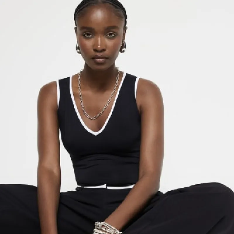 Black tipped sleeveless bodysuit sold by River Island
