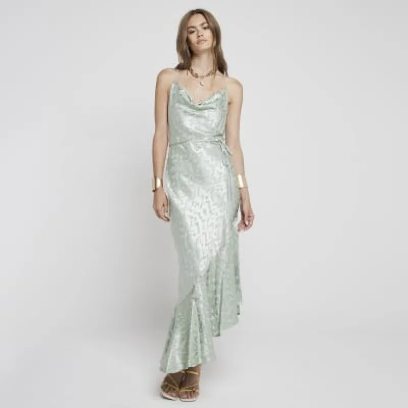 Green jacquard asymmetric slip maxi dress sold by River Island