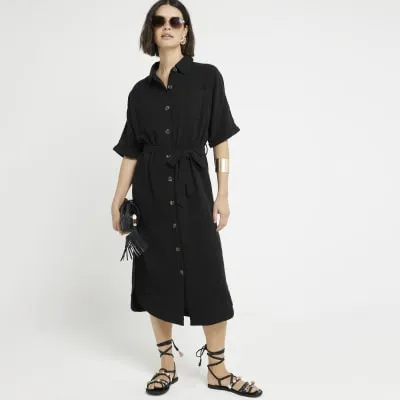 Black textured belted midi shirt dress sold by River Island
