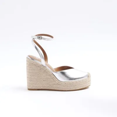 Silver espadrille heeled wedge sandals sold by River Island