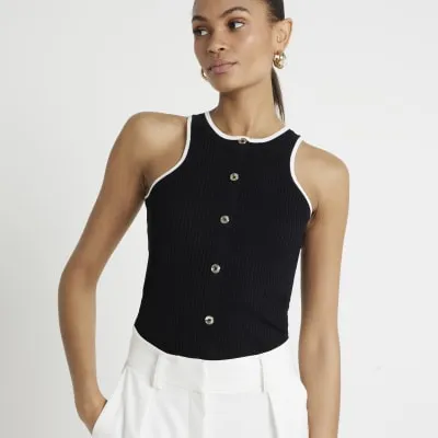 Black button through ribbed vest top sold by River Island