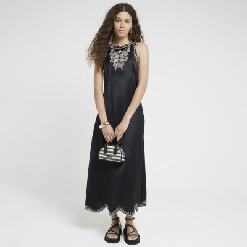 Black broderie Slip Midi Dress sold by River Island