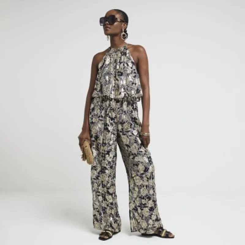 Black metallic halter neck jumpsuit made by River Island