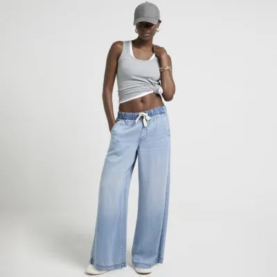 Blue mid rise drawstring wide leg jeans sold by River Island