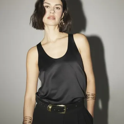 Black Scoop Neck Satin Tank Top sold by River Island