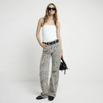 Cream spaghetti strap square neck bodysuit sold by River Island