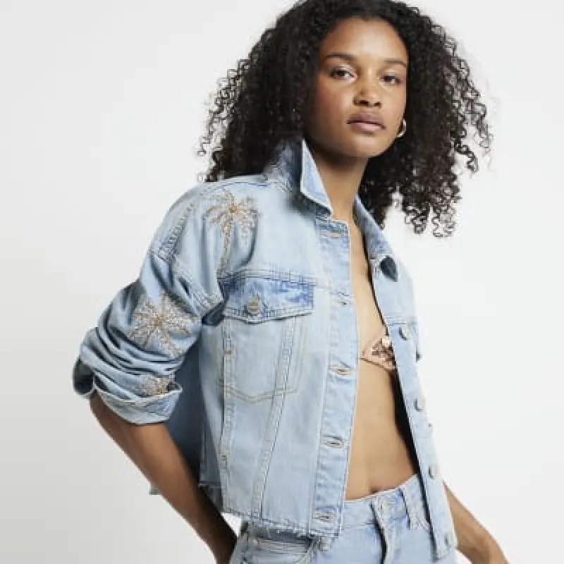 Blue sequin embellished denim jacket made by River Island
