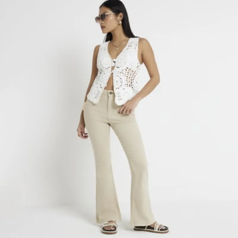 Petite Beige High Waisted Flared Jeans made by River Island