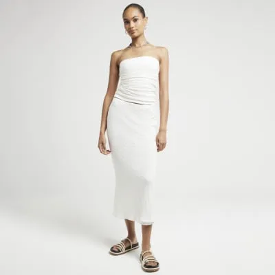 Cream Textured Ruched Tube Top sold by River Island