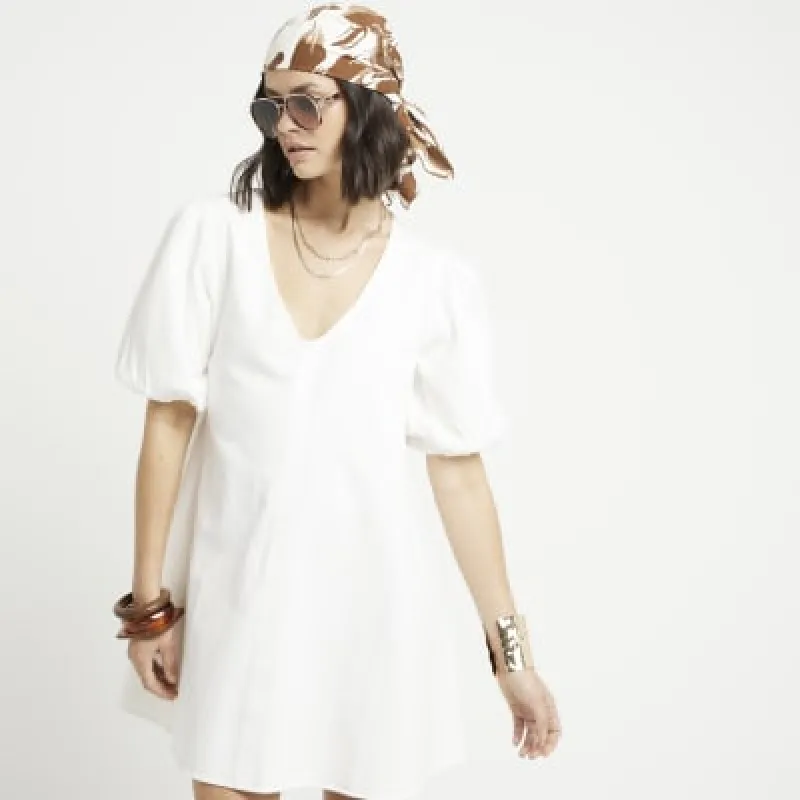 White Denim Puff Sleeve Smock Mini Dress sold by River Island