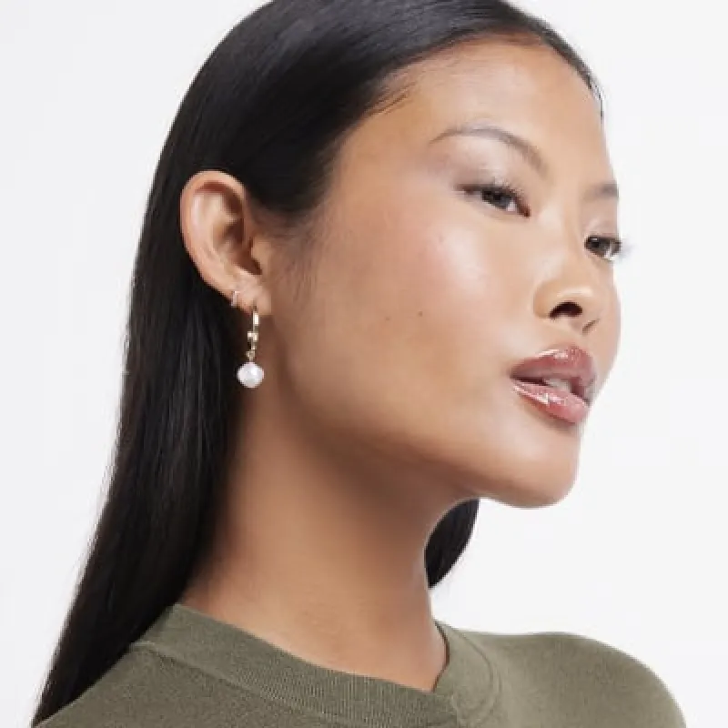 Gold pearl hoop earrings multipack sold by River Island
