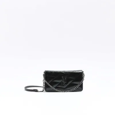 Black quilted chain cross body bag sold by River Island