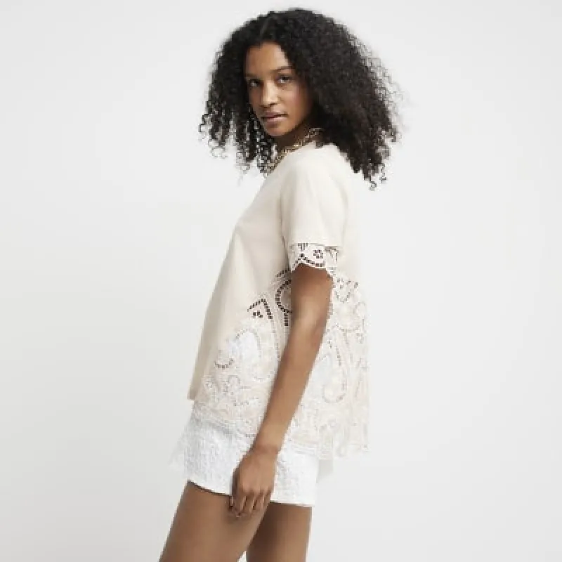 Beige broderie detail t-shirt sold by River Island