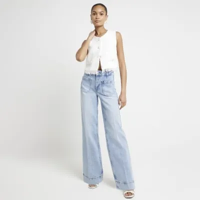 Blue high waisted wide leg jeans sold by River Island