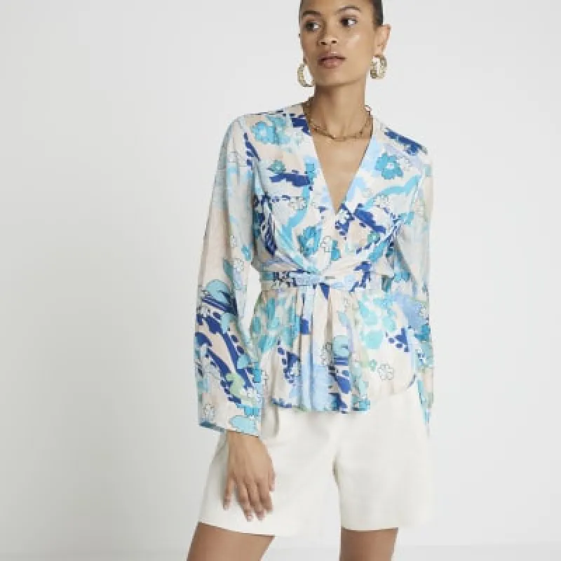 Blue floral tie front blouse sold by River Island
