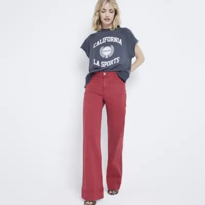 Red high waisted slim straight jeans sold by River Island