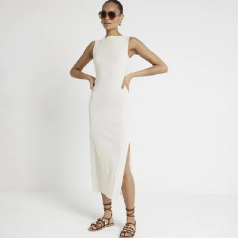 Cream crochet open back bodycon midi dress sold by River Island