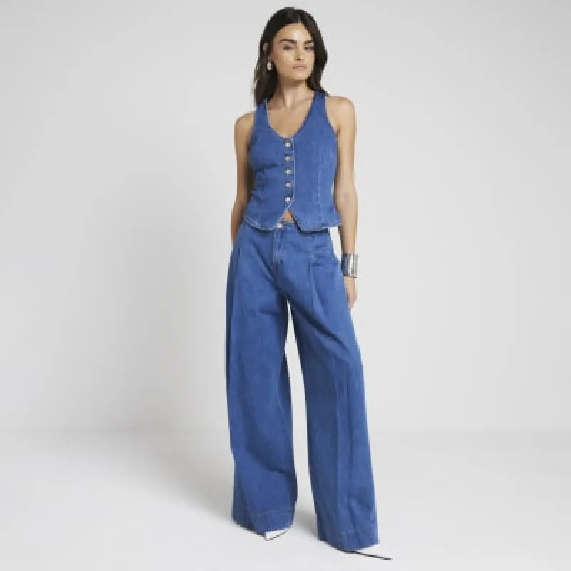 Blue mid rise pleated wide leg jeans sold by River Island