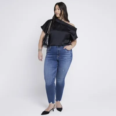 Plus blue skinny jeans sold by River Island