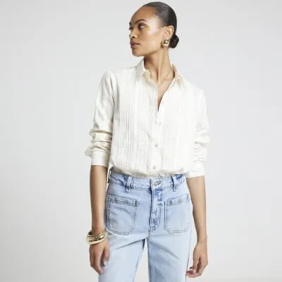 Cream lace panel shirt sold by River Island